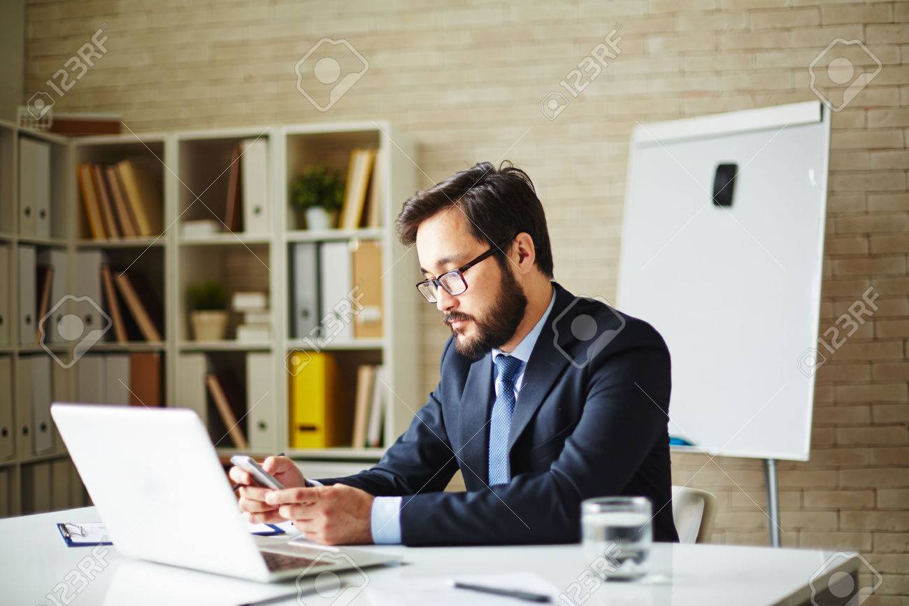 40073145-male-employee-working-in-office